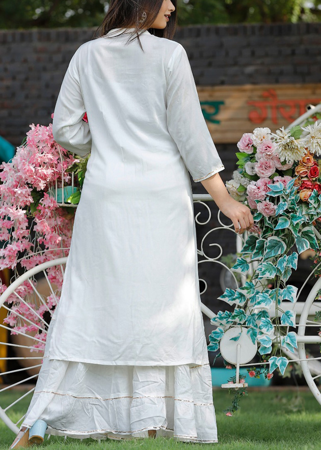 evergreen white kurti with chicken work  Qurbat Clothing